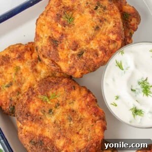 Closeup shot of air fryer salon patties on a serving tray.