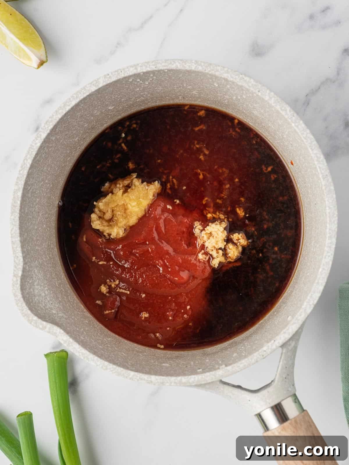 How to make the spicy honey sriracha chicken marinade, combining all sauce ingredients.