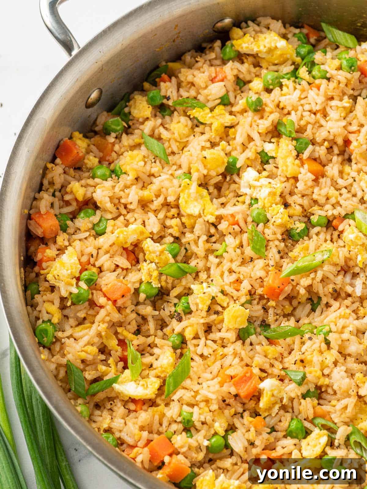 A skillet full of the best Chinese fried rice, freshly cooked.
