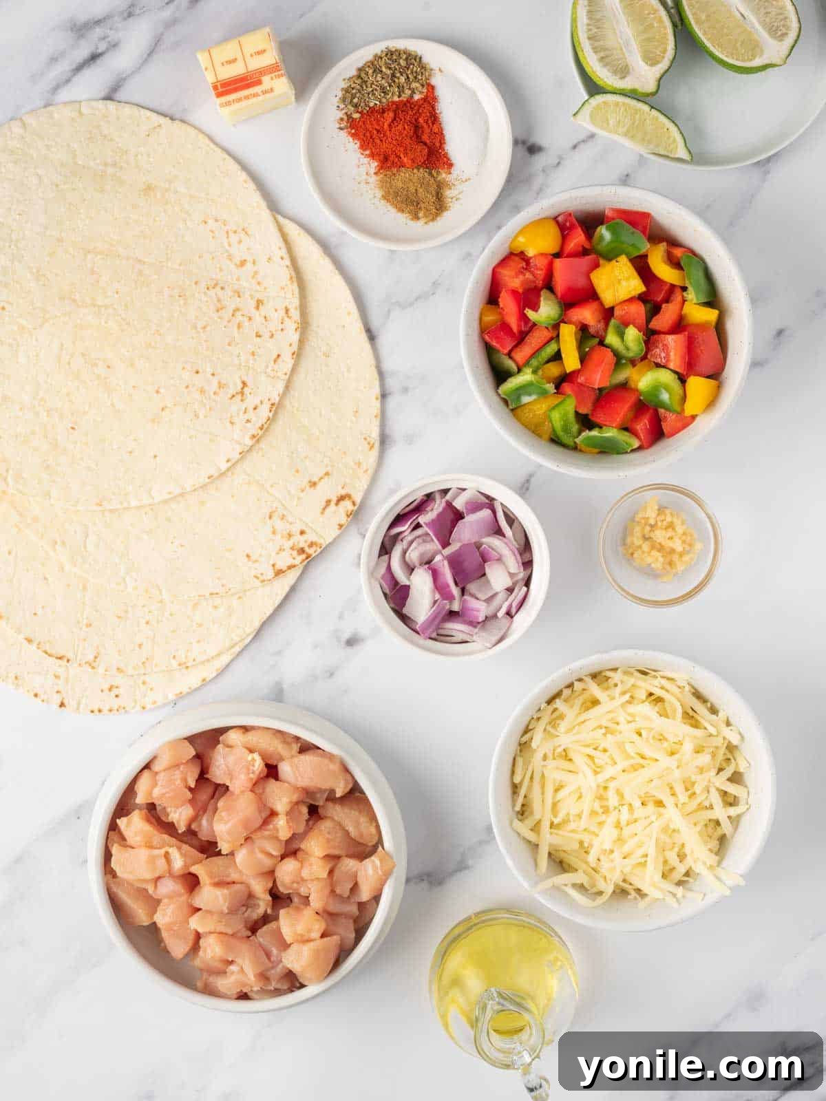 Ingredients needed for easy chicken quesadillas.