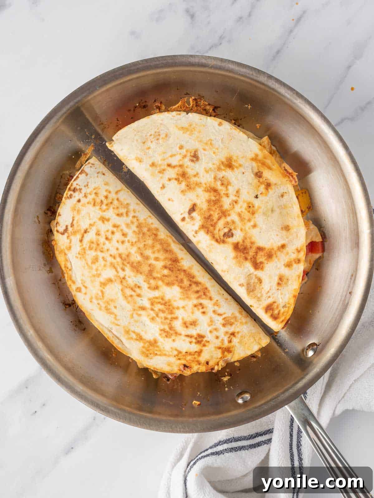 Homemade quesadilla recipe in a pan.