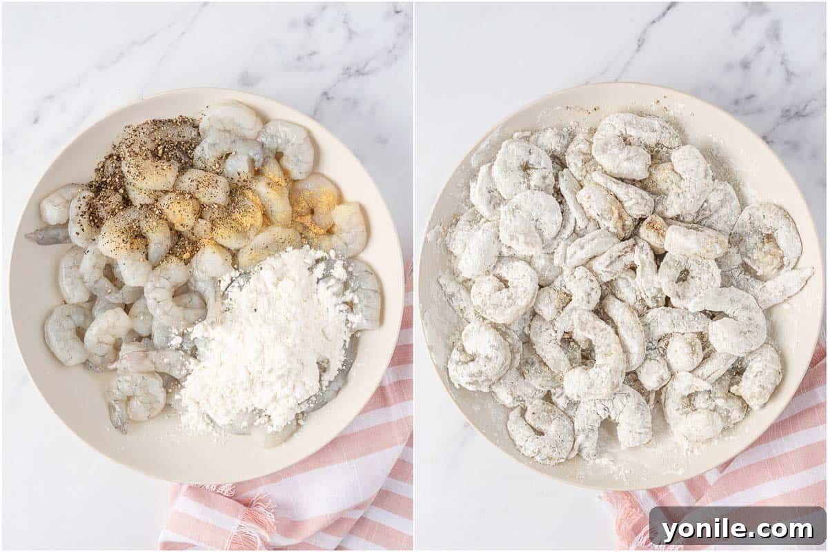 Dynamite Prawns 4 Seasoning and coating shrimp with cornstarch for frying.