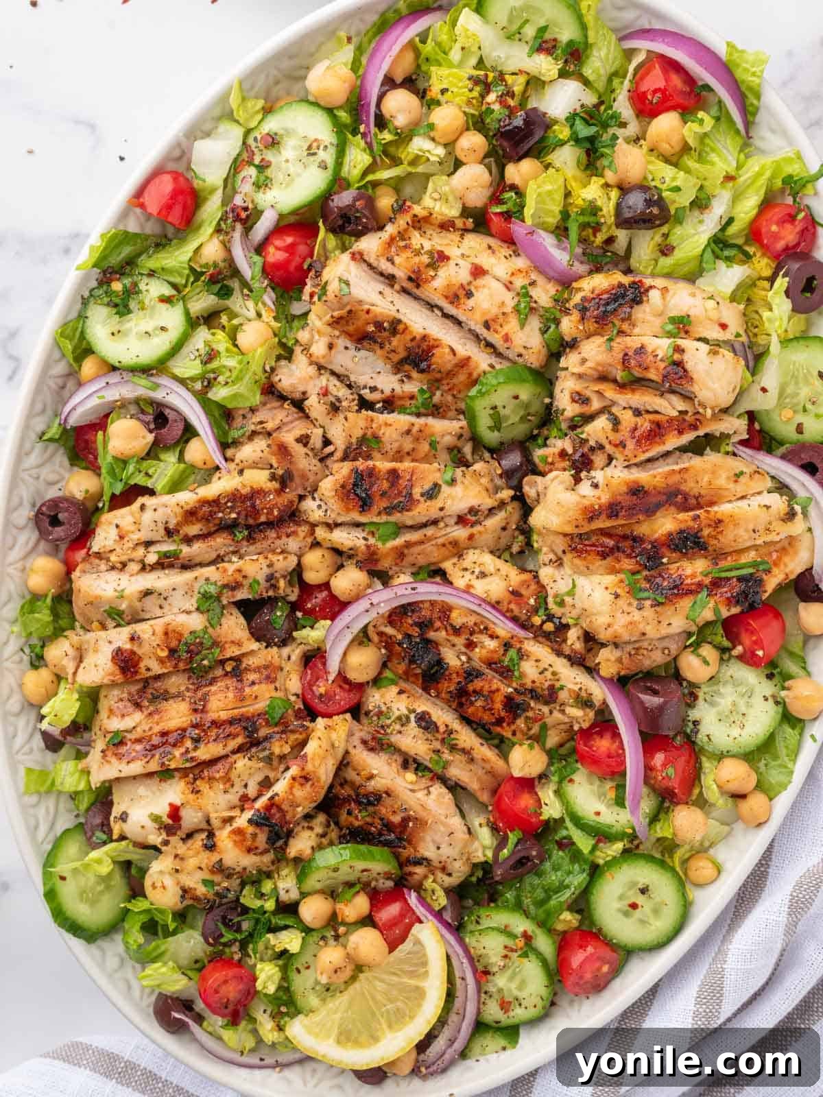 Lemon herb chicken salad on a platter.
