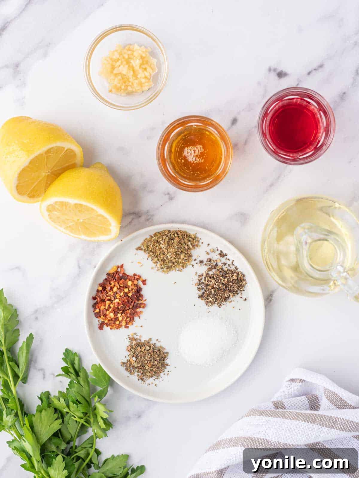 Ingredients needed for lemon herb chicken salad marinade and dressing.