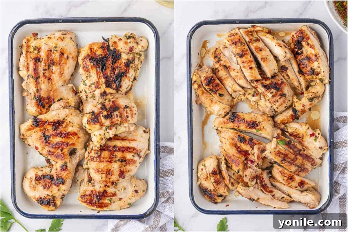 Grilled chicken sliced for serving on salad.