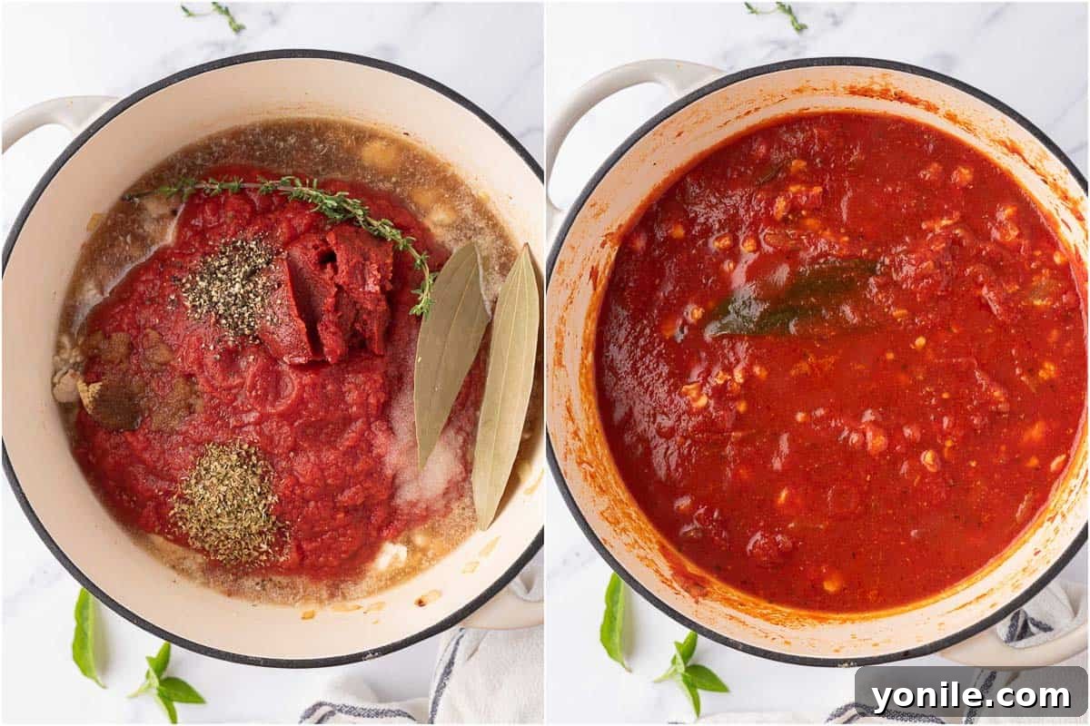 The process of creating the rich sauce base for chicken spaghetti bolognese in a pot.
