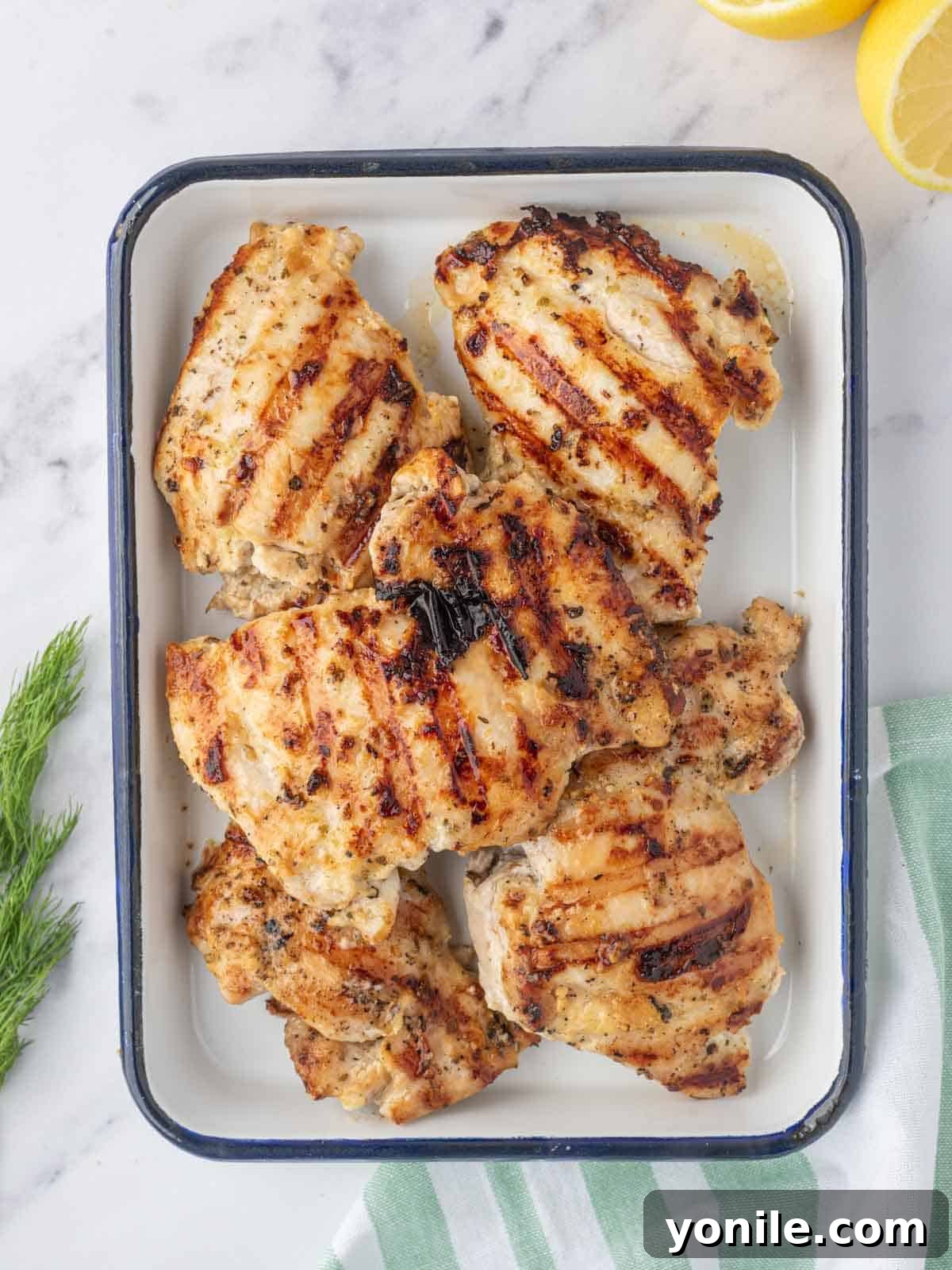 Vibrant Greek Grilled Chicken Salad 5 A platter of grilled yogurt marinated chicken.