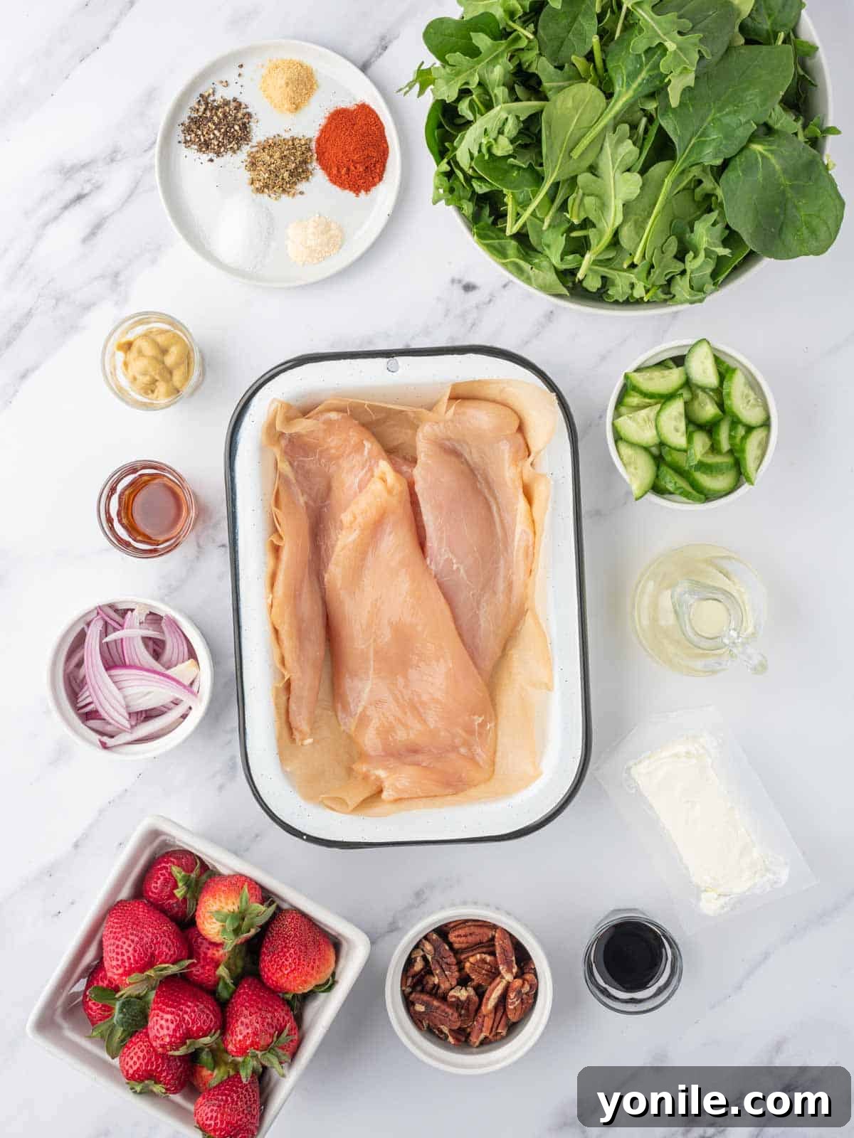 Ingredients needed for grilled chicken strawberry salad.