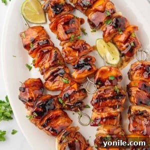 The Ultimate BBQ Chicken Skewers 9 A platter of bbq chicken skewers ready for serving.