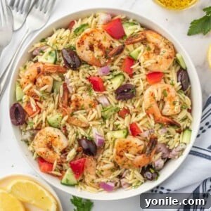Mediterranean Shrimp Orzo Salad 10 Mediterranean shrimp salad in a bowl.