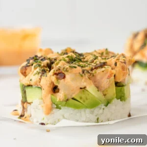 Shrimp Sushi Tower 10 Deconstructed california roll with shrimp on a plate.
