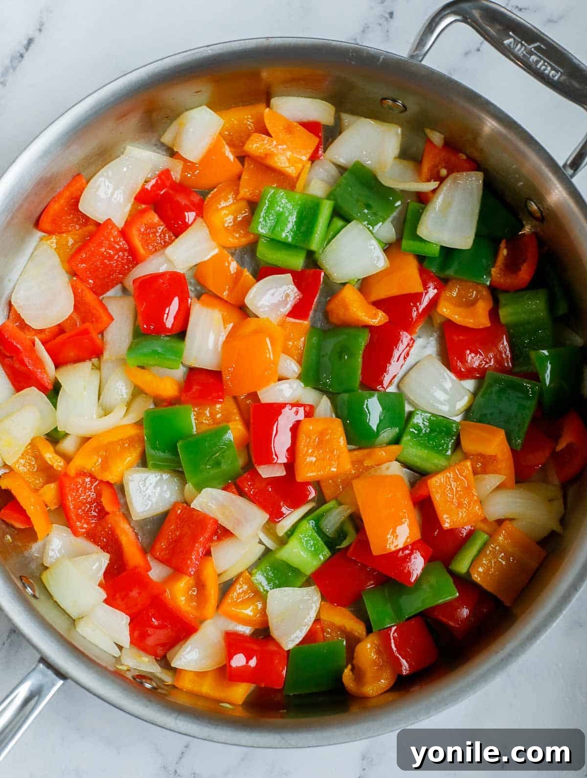 Stir fry veggies for sweet and sour chicken.