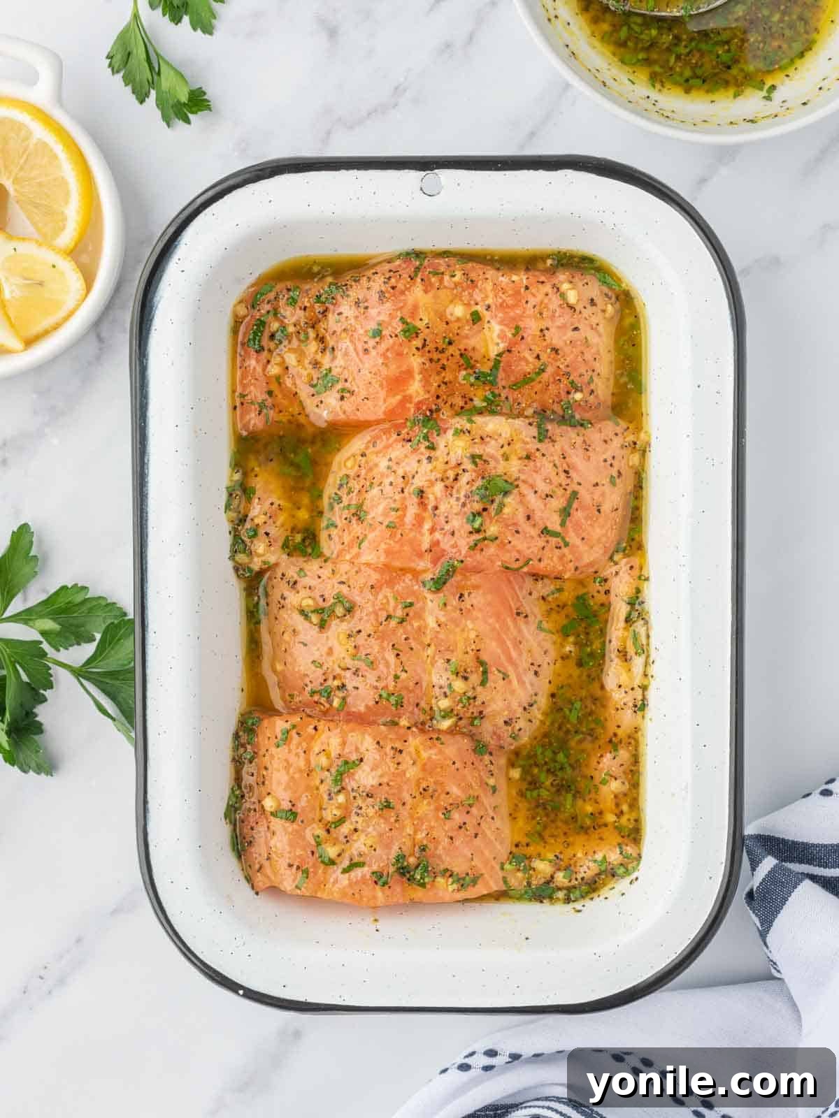 How to marinate baked lemon pepper salmon.