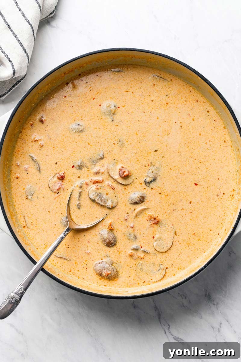 creamy mushroom sauce in a skillet