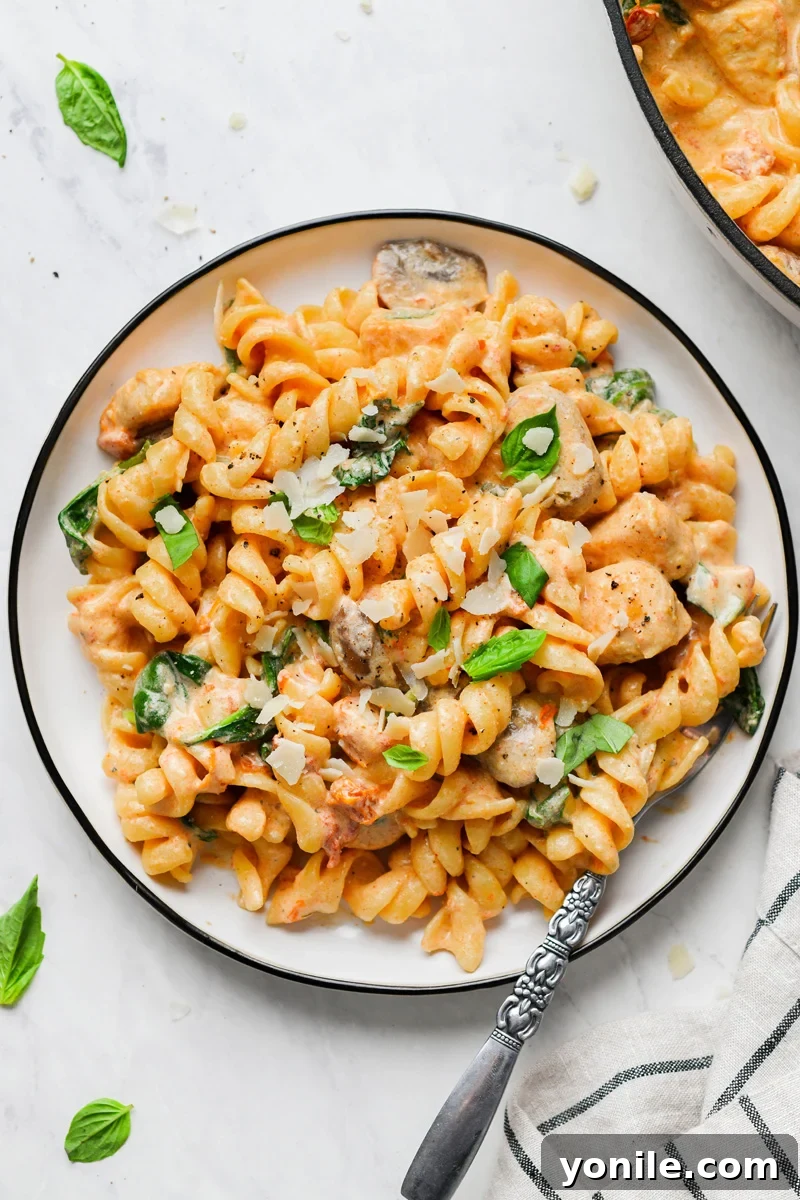 creamy mushroom chicken pasta in a plate