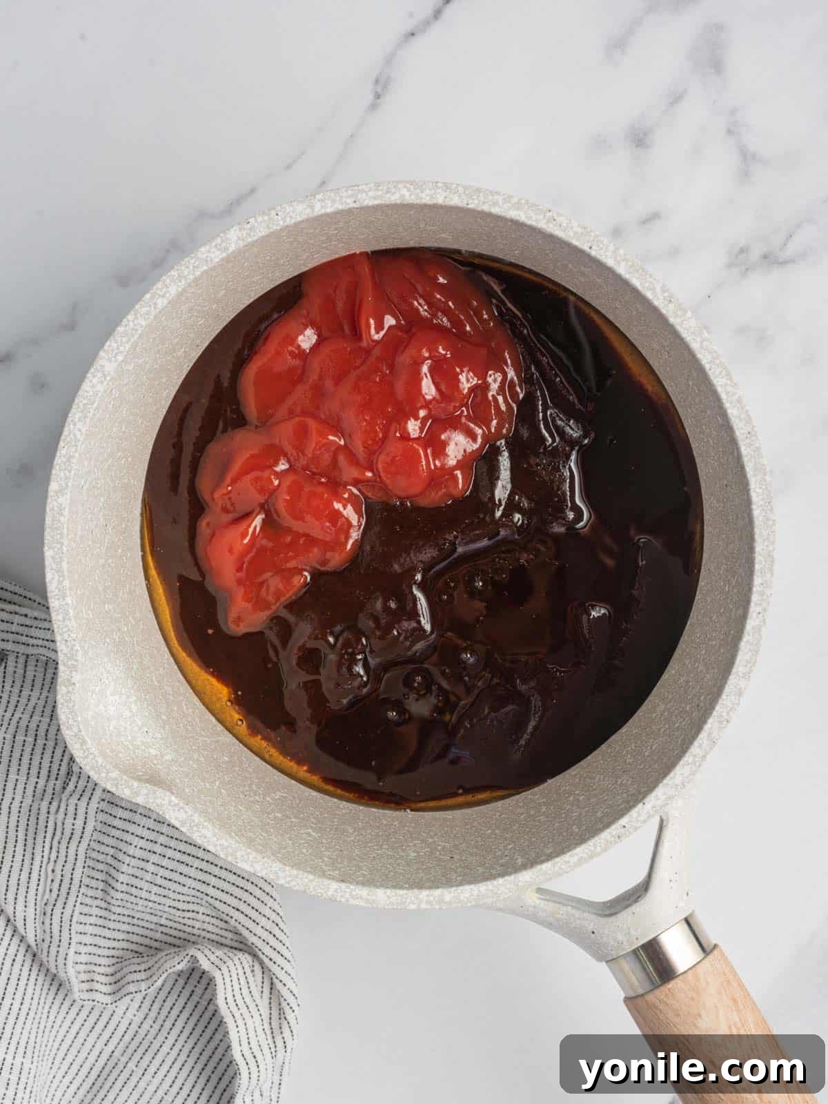 Mix bbq sauce in a saucepan.