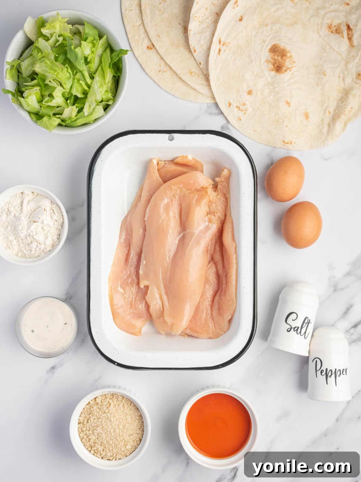 Ingredients needed for crispy buffalo chicken wrap.