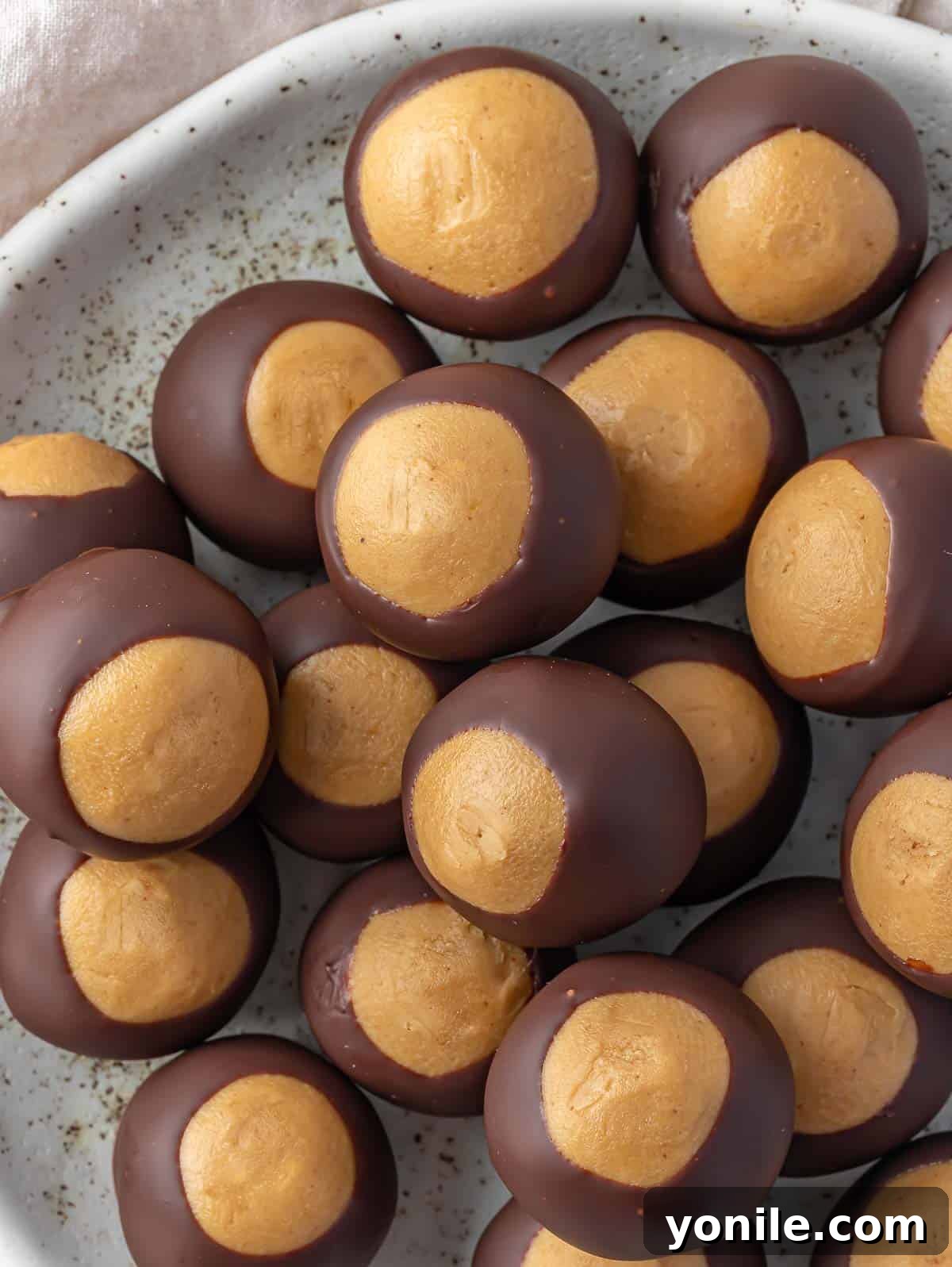Buckeye peanut butter balls on a plate.
