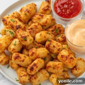 Cheesy tater tots with ketchup.