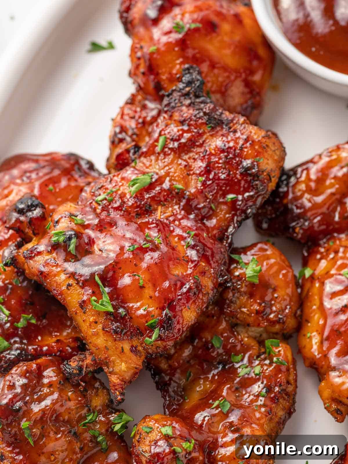 Air Fryer BBQ Chicken Perfection 7 Closeup of air fryer barbecue chicken thighs.
