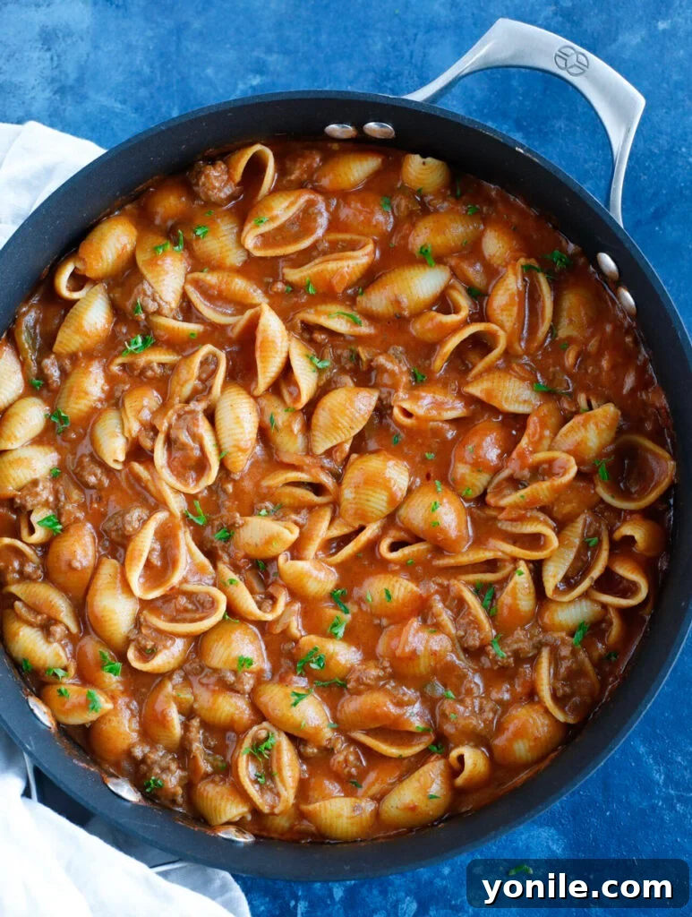 Delicious and cheesy Beef Taco Pasta served in a bowl, ready to eat.