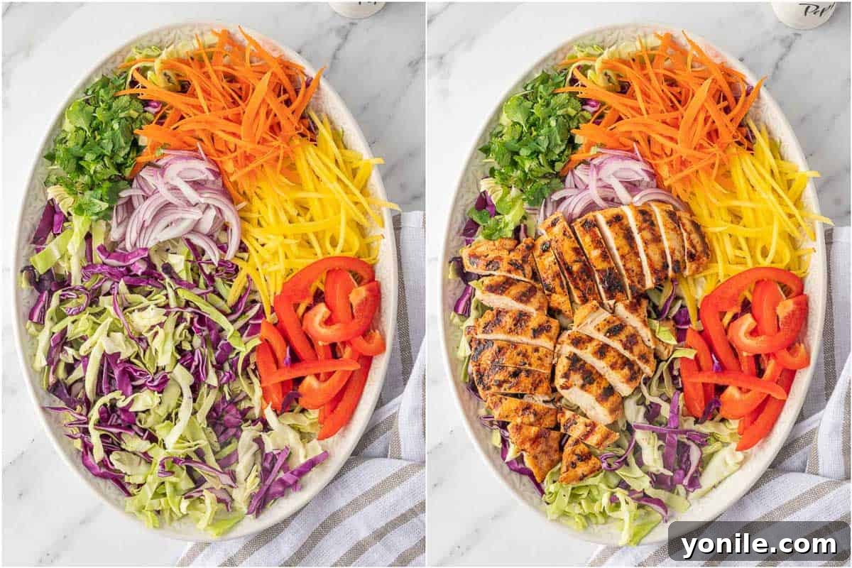 Layering grilled chicken over mango salad.