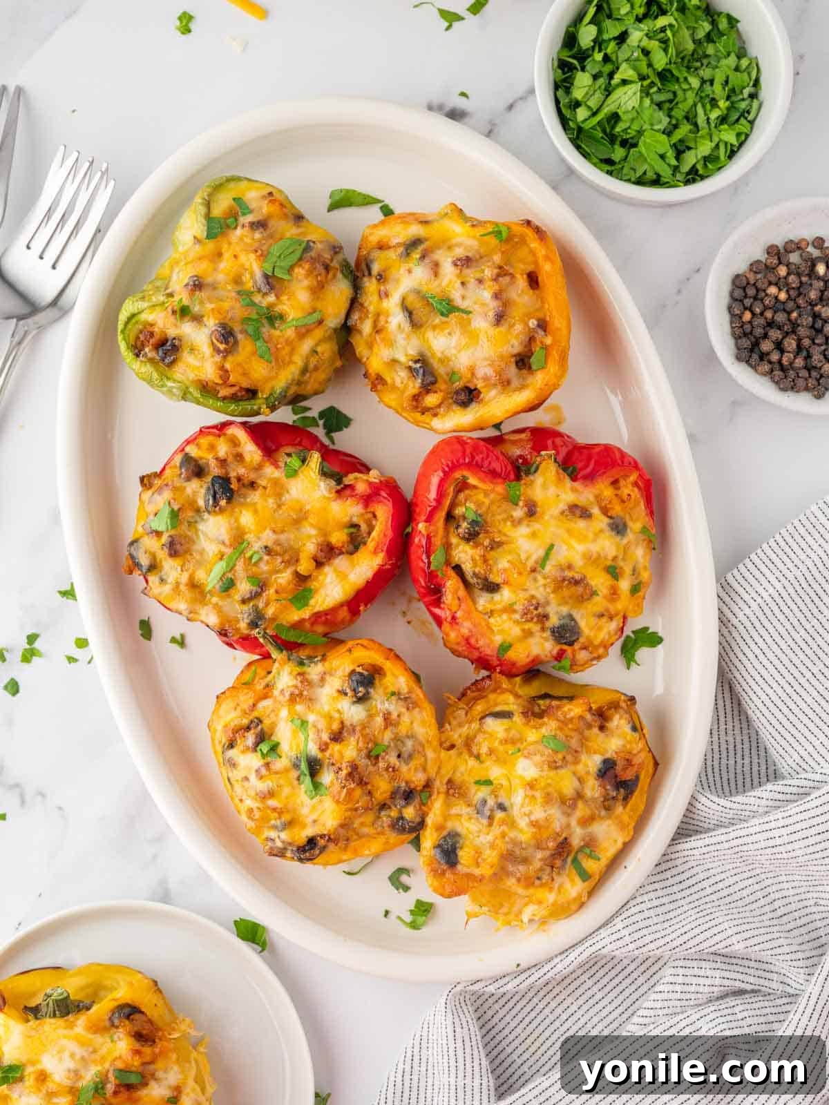 Taco stuffed peppers on a platter.