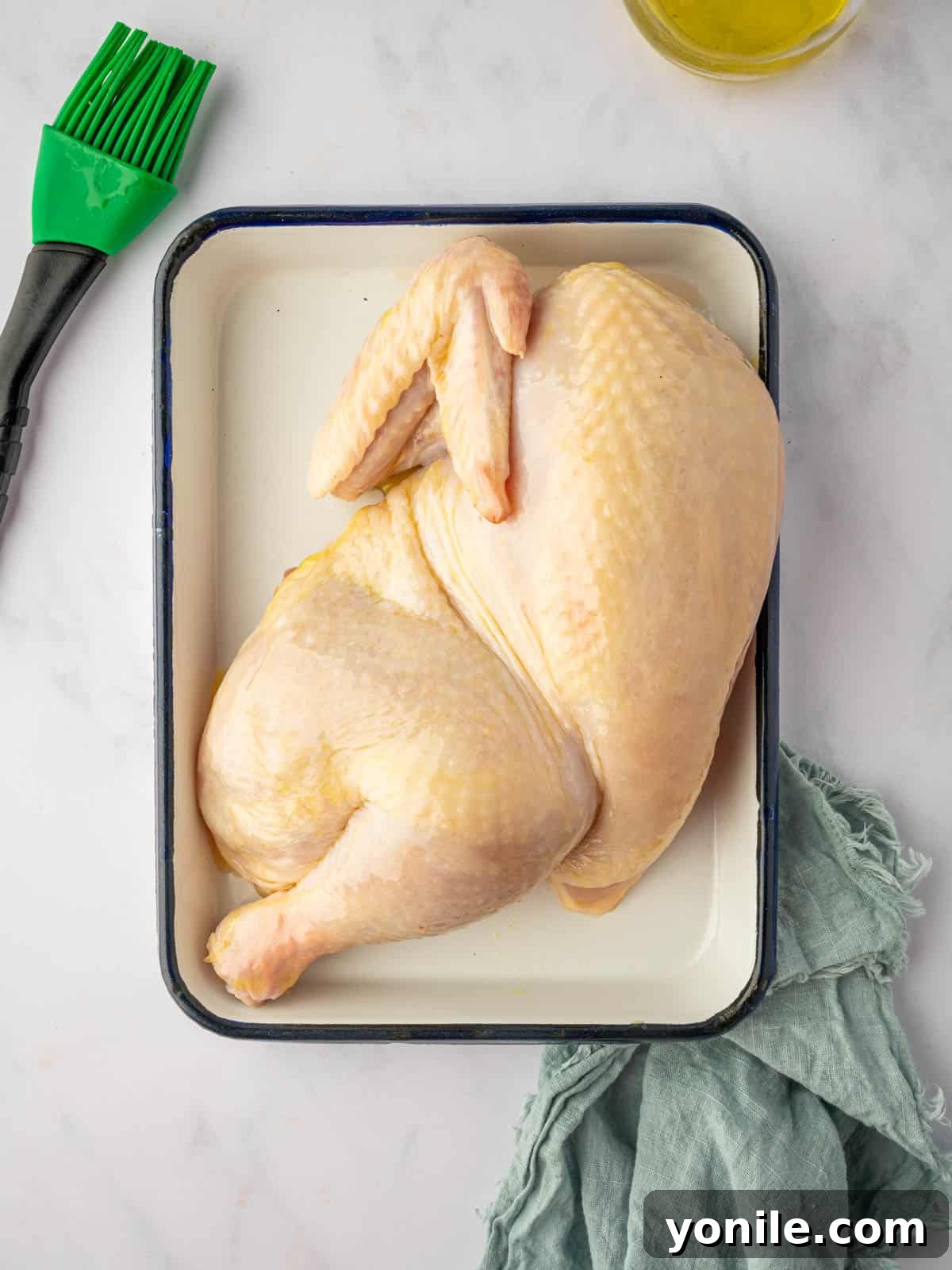 A half chicken for grilling.