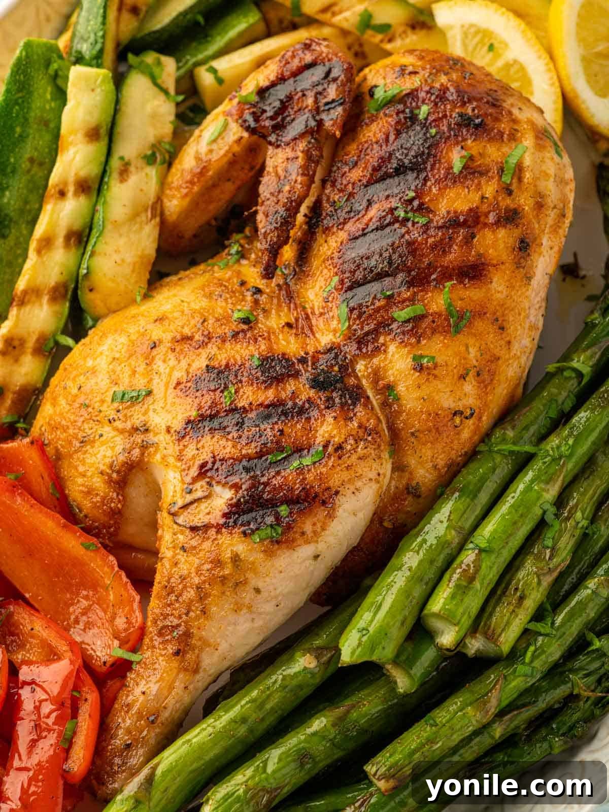 Grill marks on a half chicken.