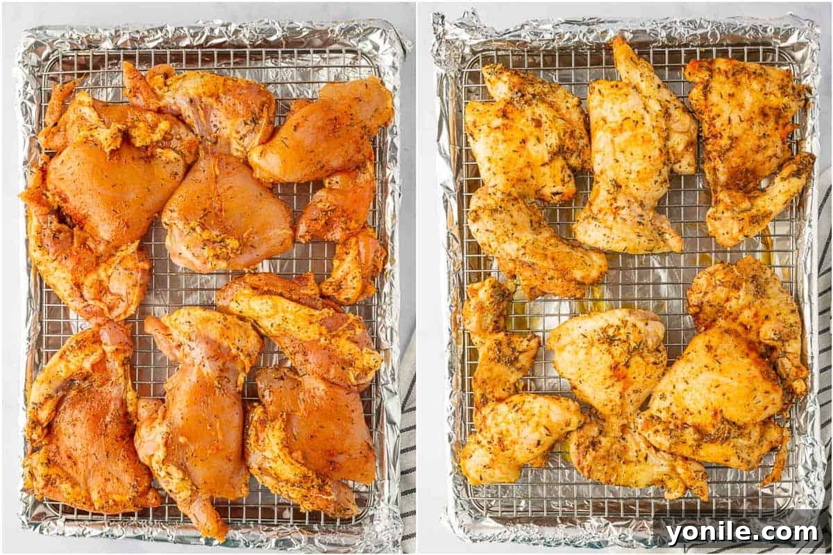 A selection of perfectly seasoned chicken thighs, both skin-on and skinless, arranged on a baking sheet, ready for the oven.