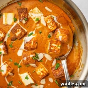 Closeup of paneer pasanda in a skillet.