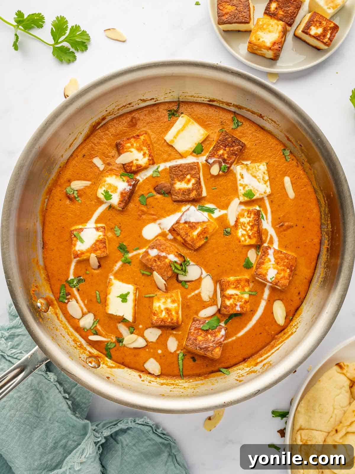 Royal Paneer Pasanda 9 A skillet of Paneer Pasanda, with fried paneer cubes mixed into the creamy gravy, ready for garnishing.