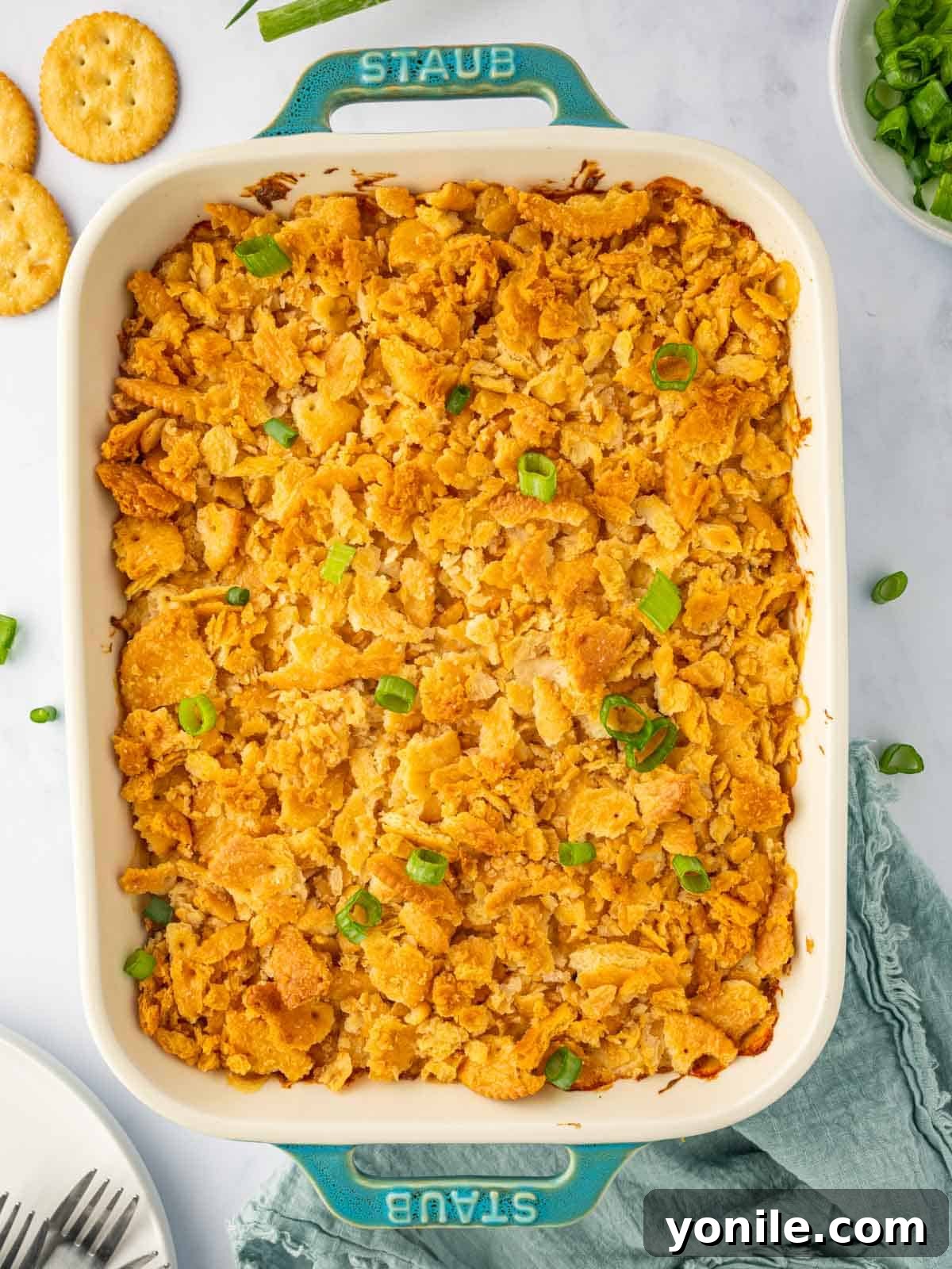 Decadent Chicken Bake 2 Crispy ritz cracker chicken in a casserole dish.