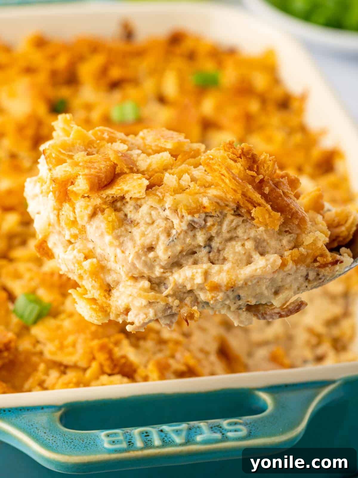 Decadent Chicken Bake 6 A scoop of million dollar chicken is served.