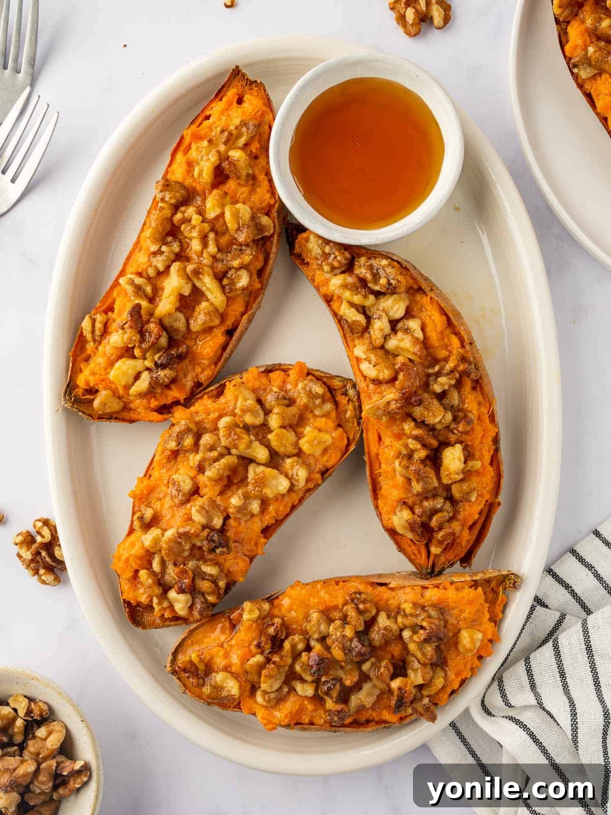 Twice baked sweet potatoes on a tray.