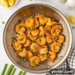 Chinese salt and pepper Shrimp in a skillet.