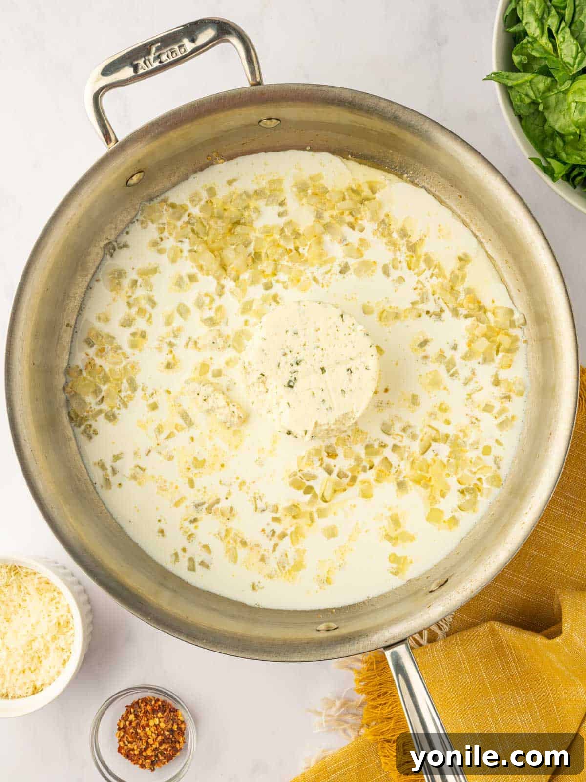 Gently melt the boursin cheese.