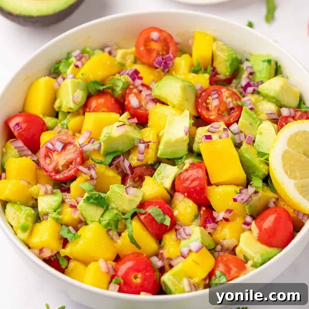 Avocado mango salad after mixing the ingredients together.