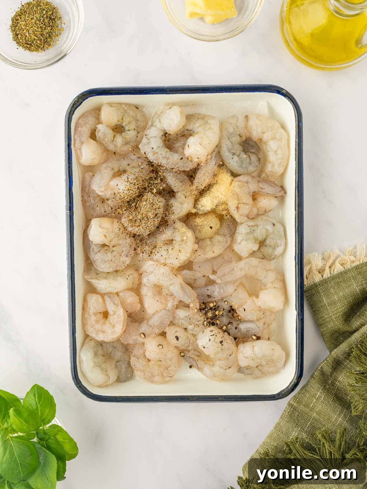 Prawn Pasta Perfection 4 Raw shrimp seasoned with oregano, garlic powder, salt, and pepper.