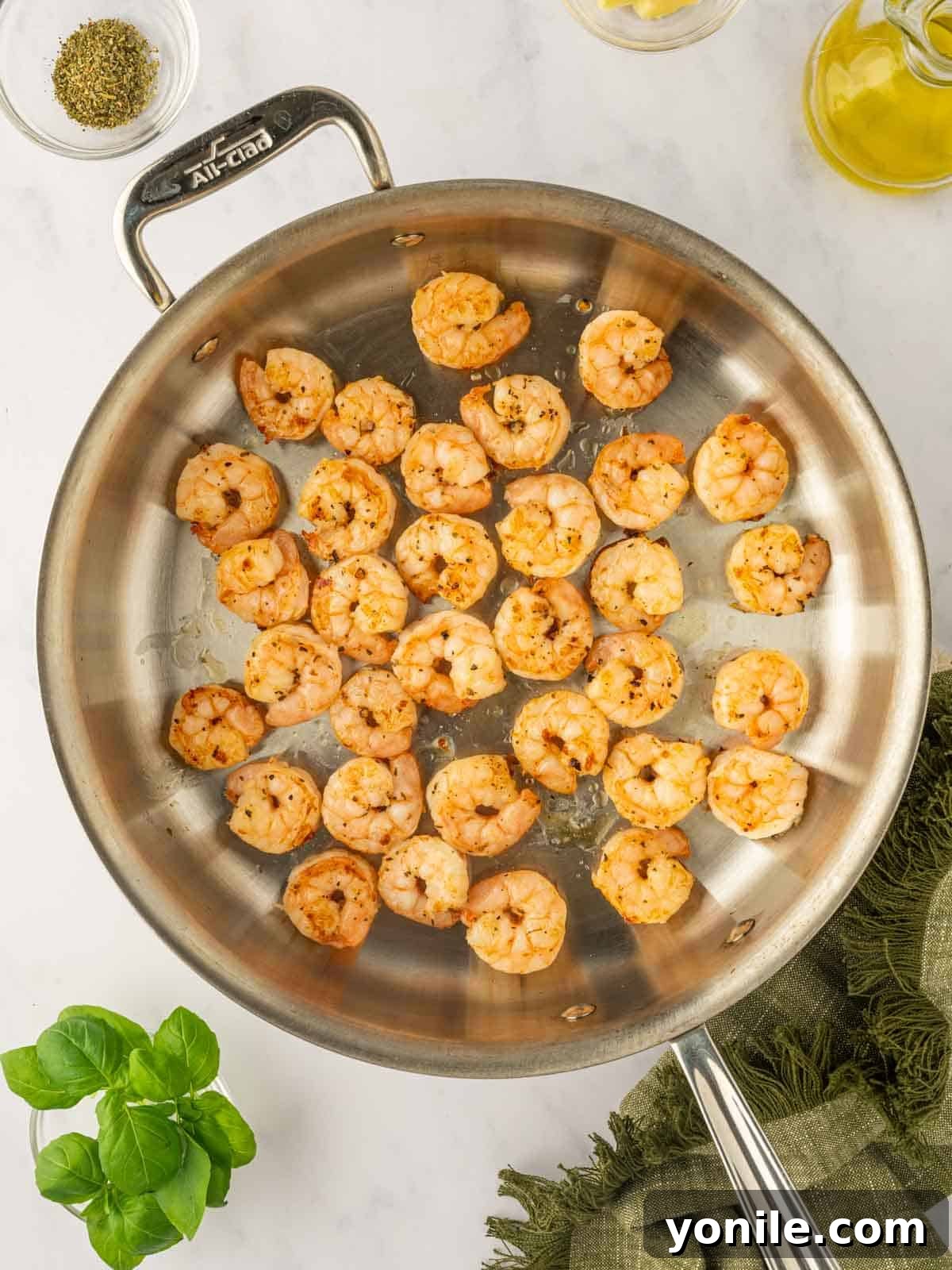 Prawn Pasta Perfection 5 Shrimp being sautéed in a hot skillet until pink and tender.