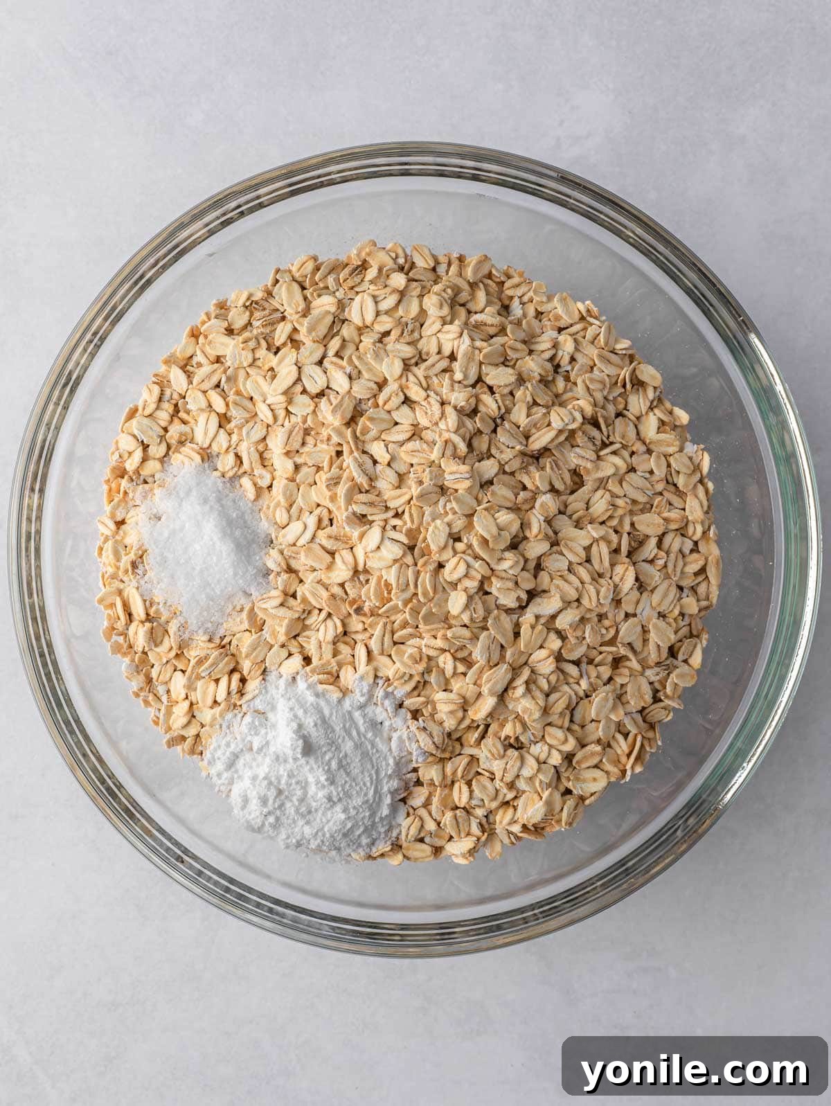 Process shot of dry ingredients in a bowl.