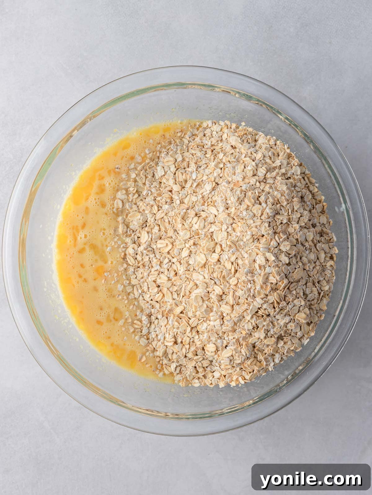 Process photo of wet and dry ingredients being combined.
