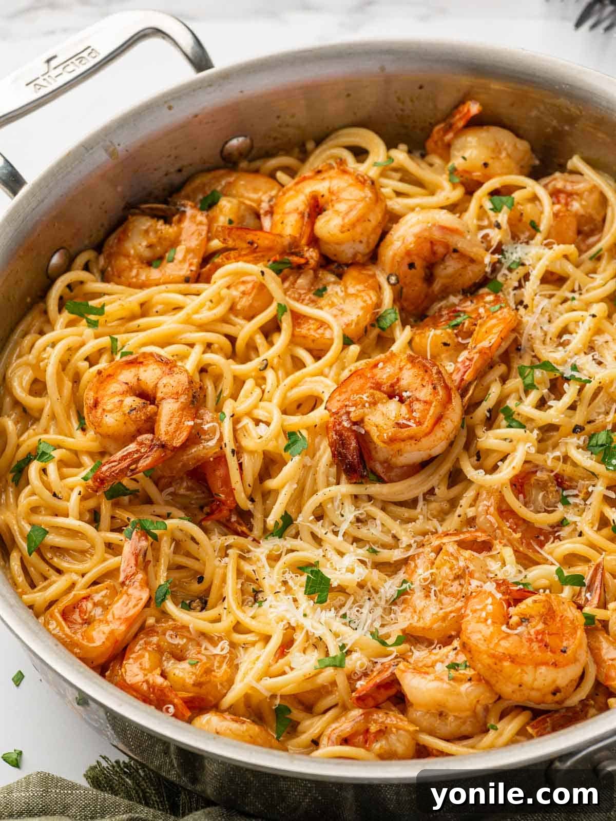 Fiery Cajun Shrimp Scampi with Linguine 11 Cajun scampi with shrimp in a skillet, ready to be served.