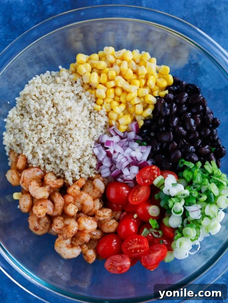 Fresh vegetables and cooked quinoa ready for the salad
