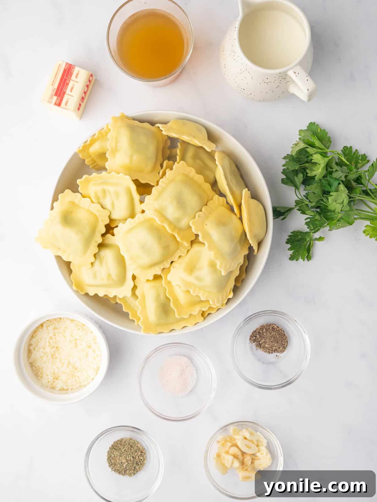 Ingredients needed for spinach and ricotta ravioli.