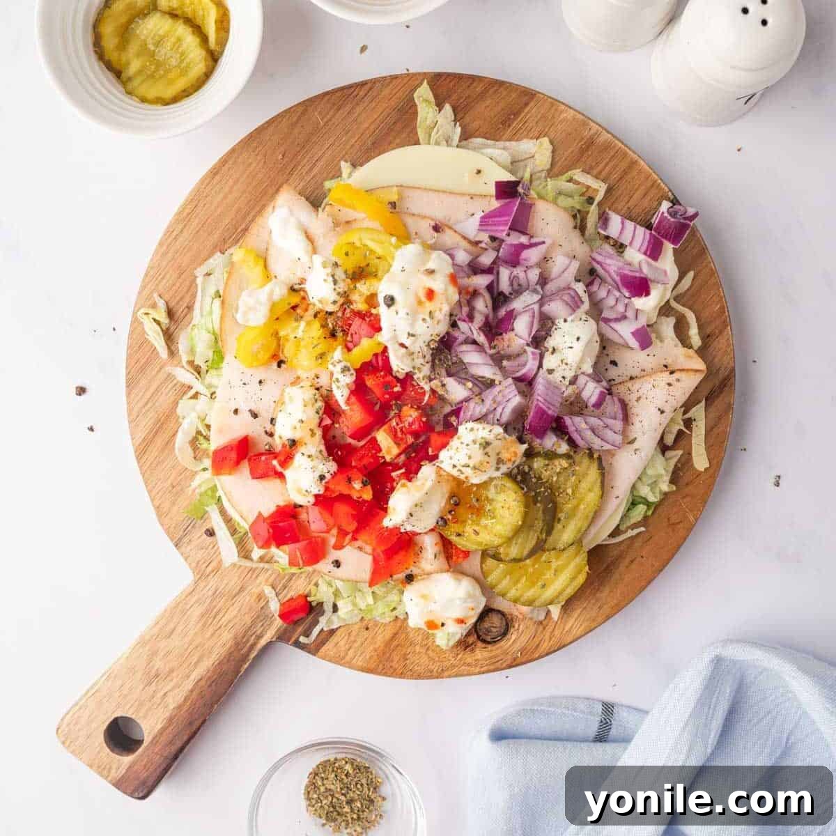Zesty Chopped Italian Hero 5 Condiments and spices added on top of the chopped deli sandwich ingredients.