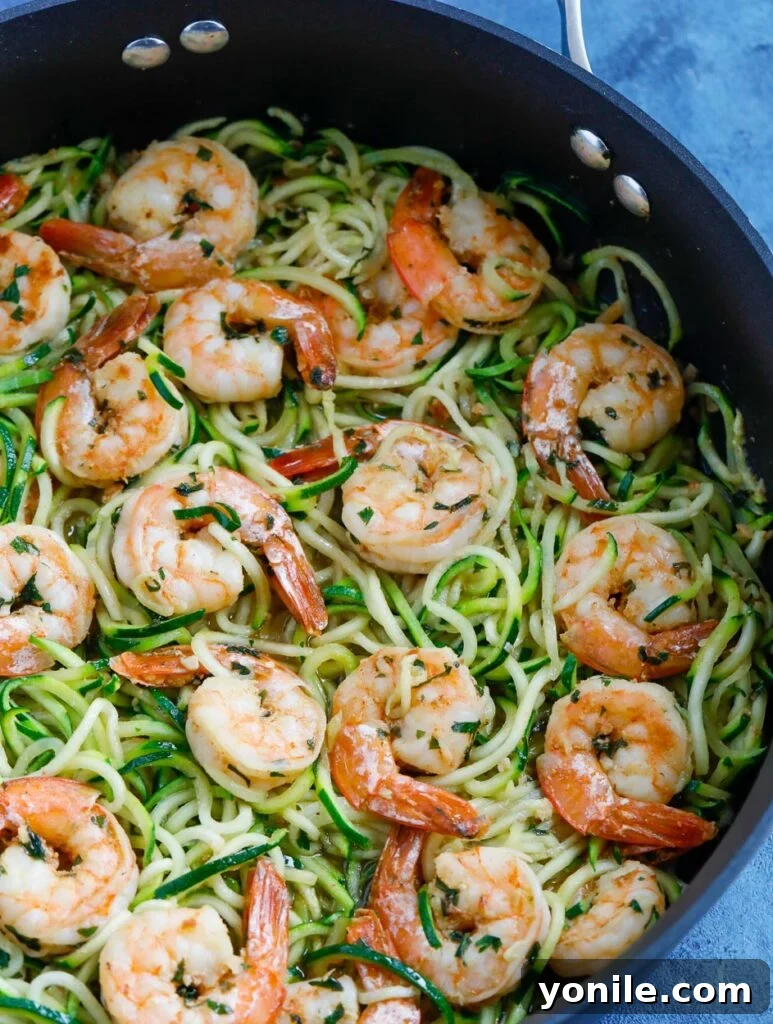 Garlic Shrimp Zoodles Close-up of a serving of garlic shrimp zoodles in a bowl