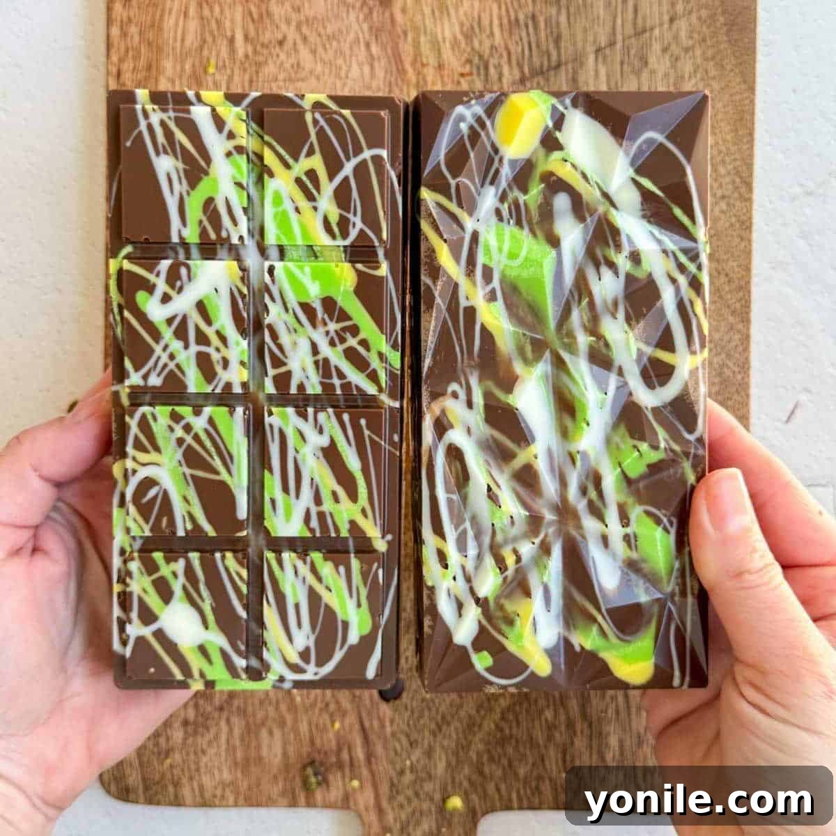 Emirate's Indulgence Bar 11 Two perfectly crafted Dubai Pistachio Chocolate Bars, side by side and ready to be enjoyed.