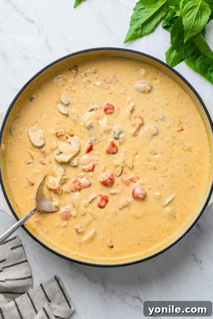 creamy tortellini sauce in a skillet
