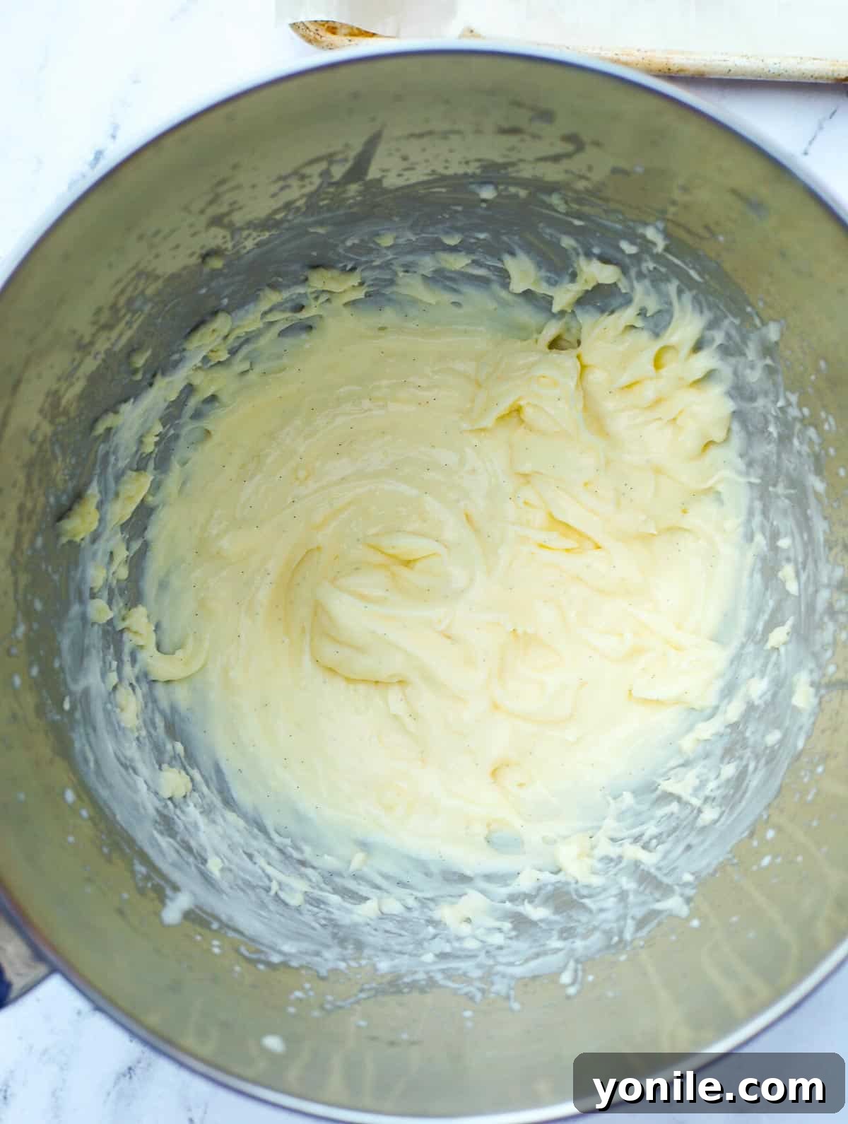 Lightened pastry cream, whipped with heavy cream, showcasing its fluffy and airy texture, ready for filling.